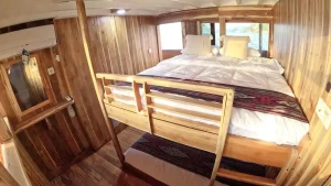 A quad ocean-view cabin aboard Malca Voyages
