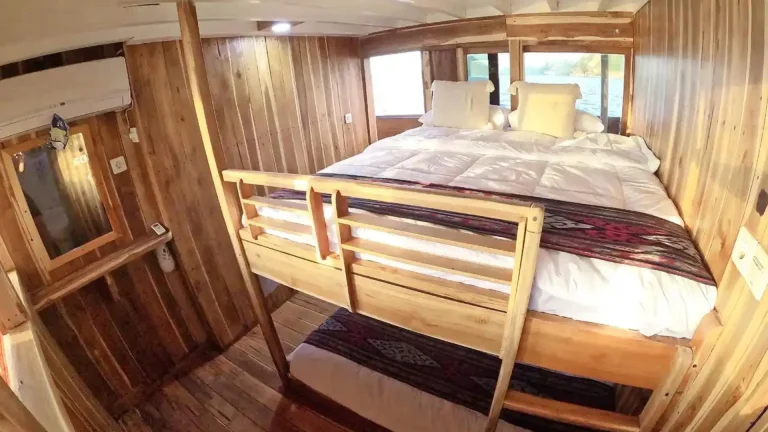 A quad ocean-view cabin aboard Malca Voyages