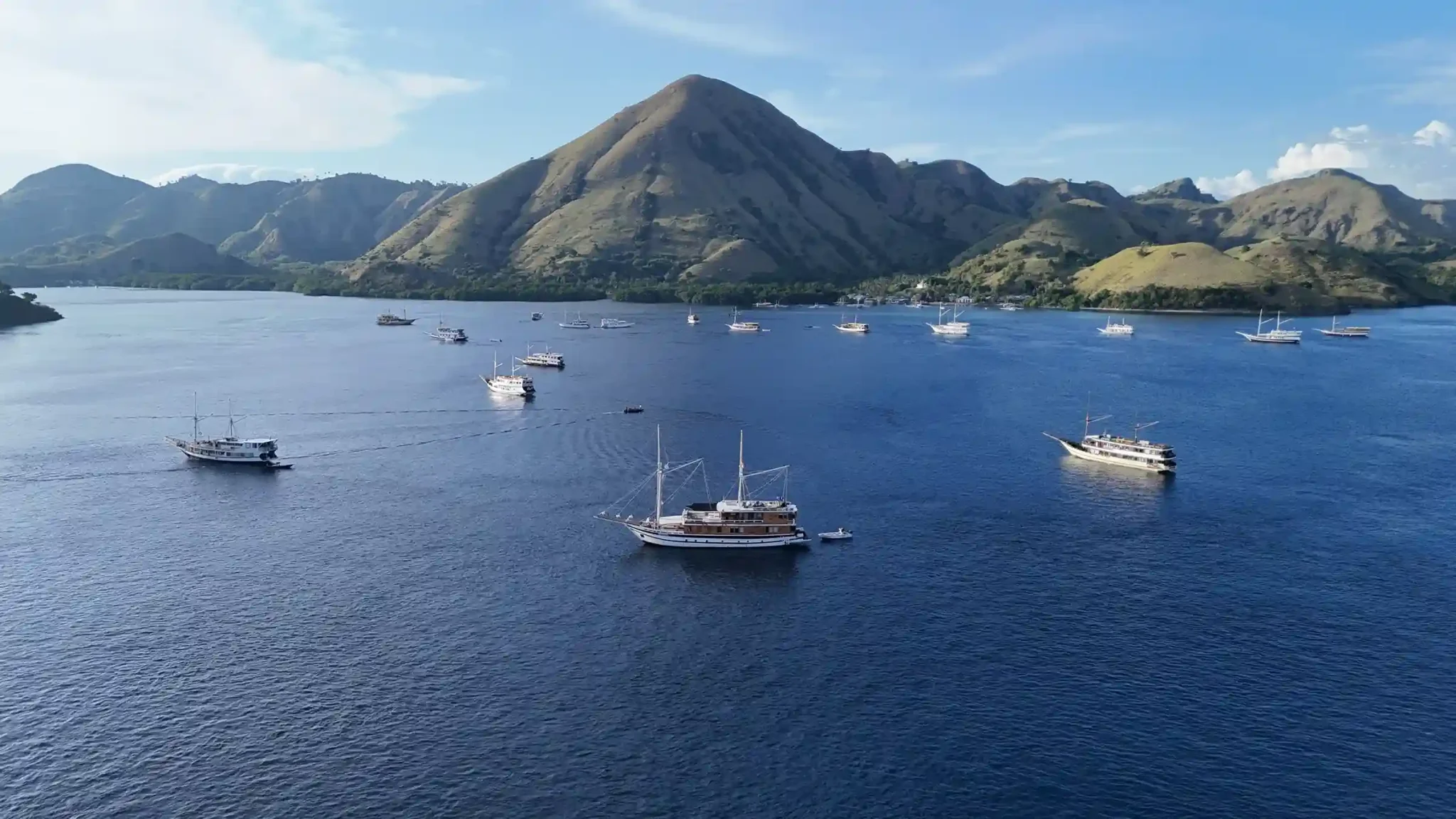 Charter vessels moored in a Komodo bay